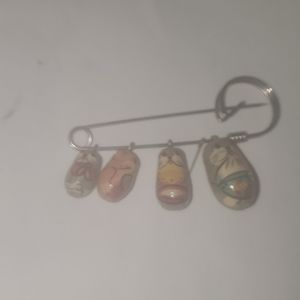 Russian doll pin